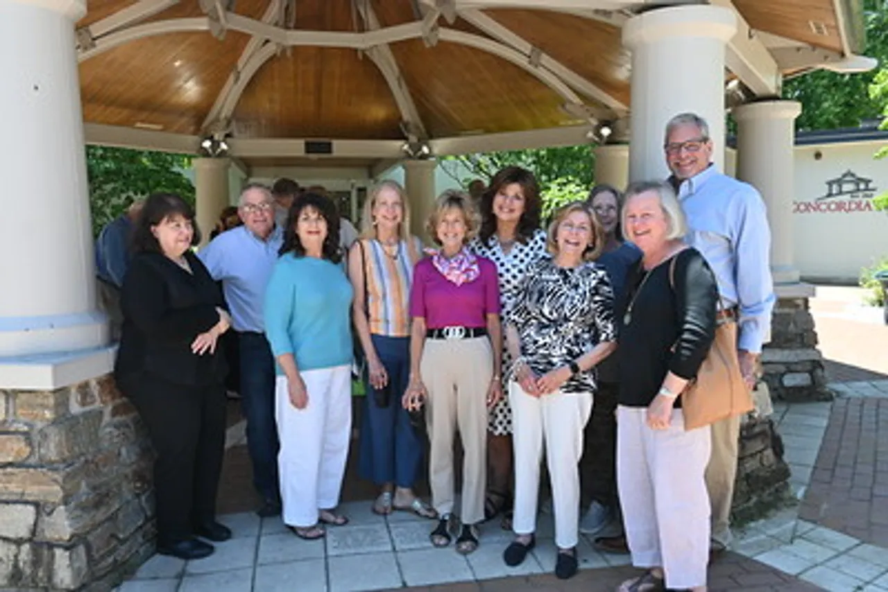 Alumni from the Class of 1976 pose for photo at their 50th reunion.