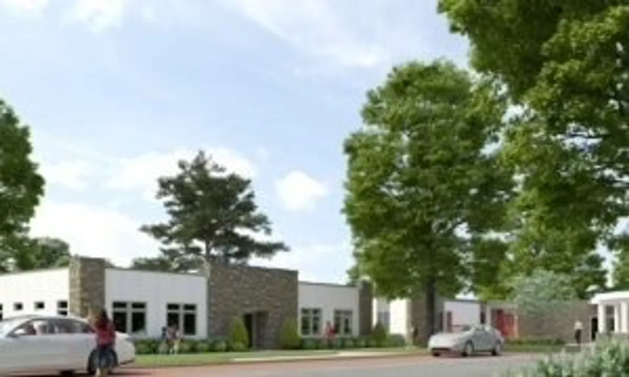 Rendering of the new classroom wing with building and trees at the front of the school