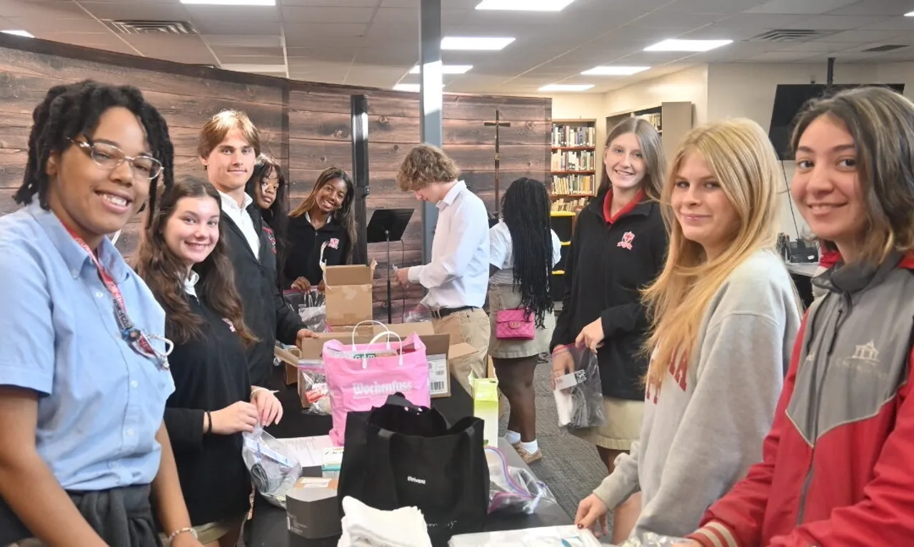 Students creating blessing kits for community members experiencing homelessness.