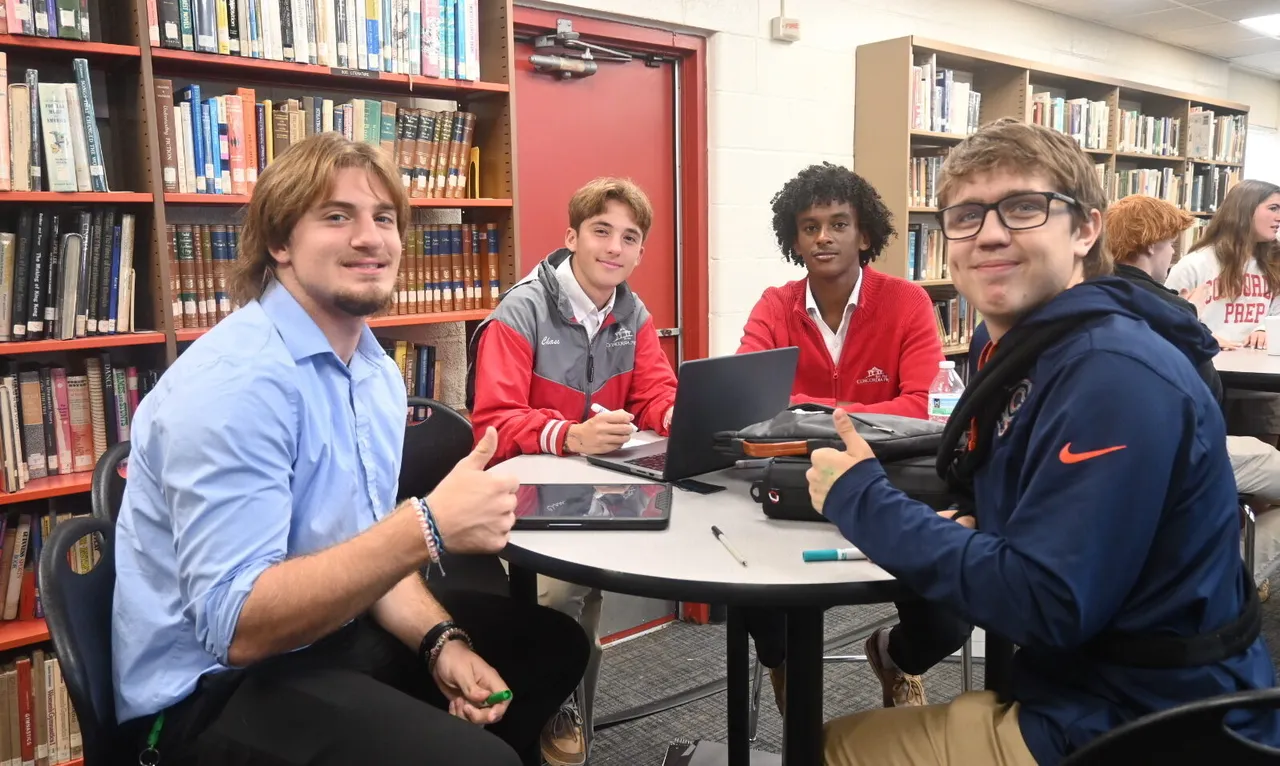 A group of Concordia Prep students smiling for the camera.