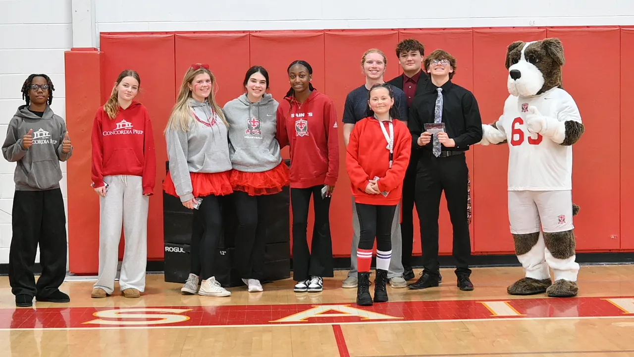 Middle and Upper School students pose for a photo during a pep rally.