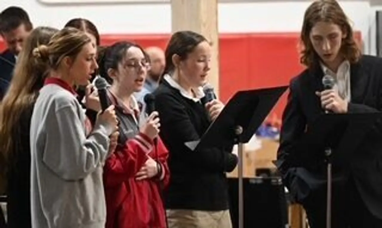 Students singing during chapel