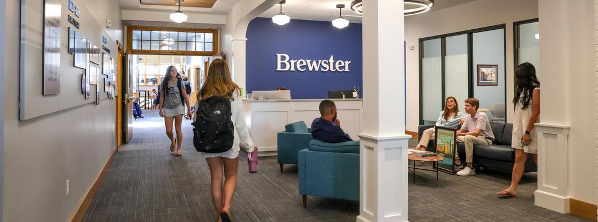 Student in renovated lobby area in the Academic Building
