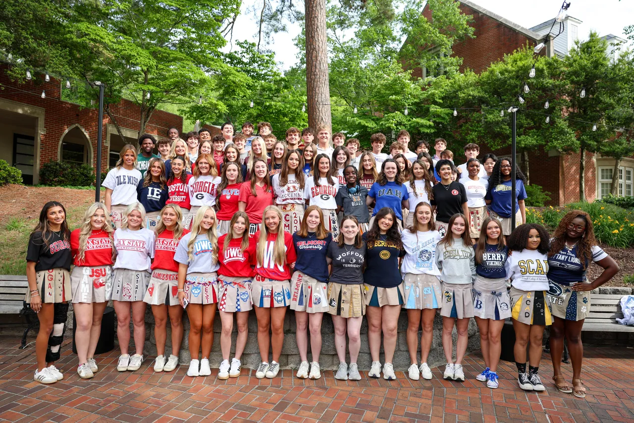 Seniors wear their college t-shirts