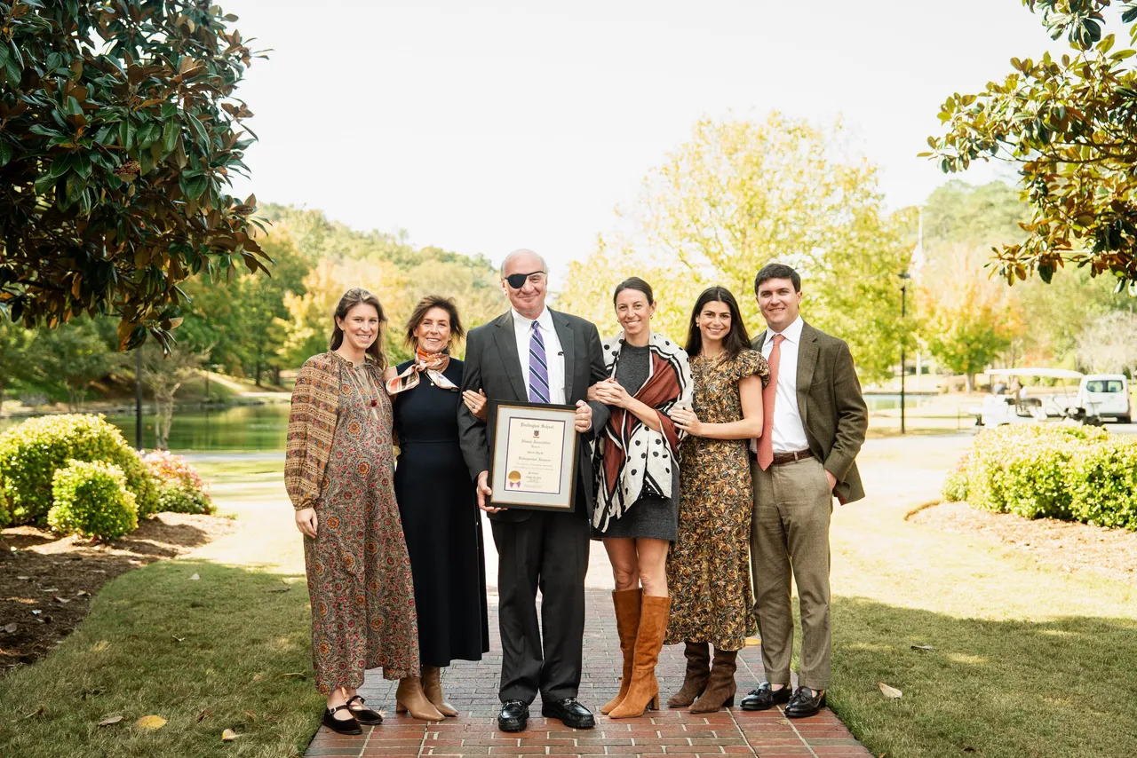 Darlington School Distinguished Alumnus John Irby and his family by the lake.