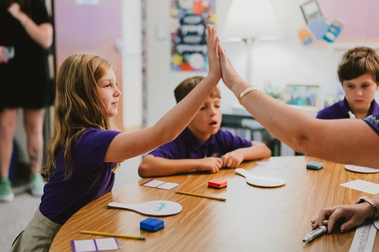 Students work in a small group in the Teaching and Learning Center's Accelerated Learning Program for Dyslexia