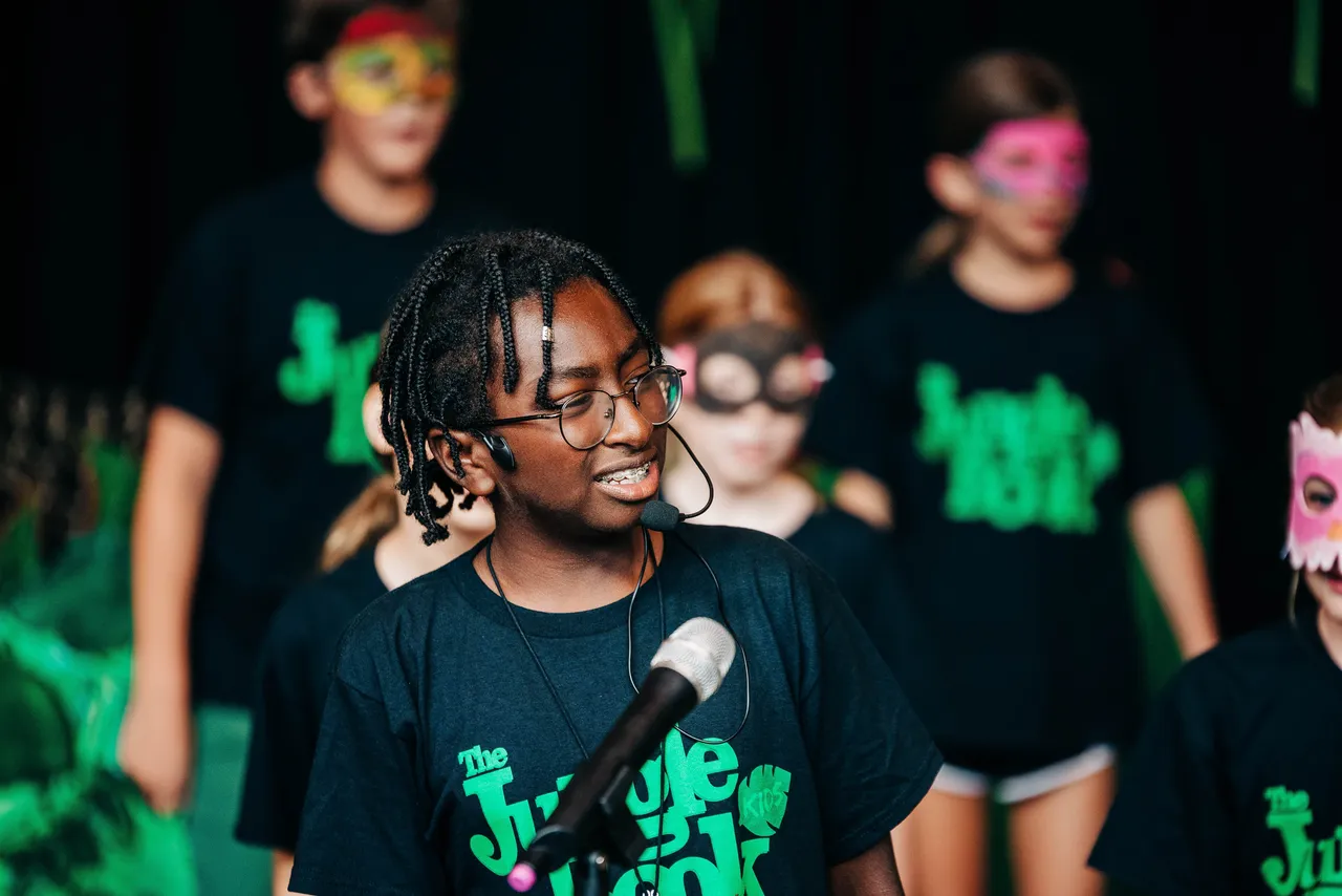 Young male camper performs on stage during Darlington School's Musical Theater Camp.