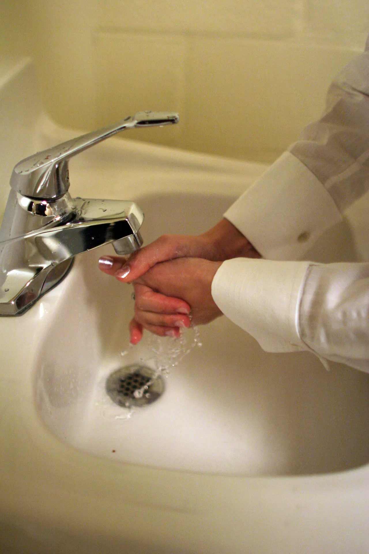 DLS and DS students washing hands and using anti bacterial products