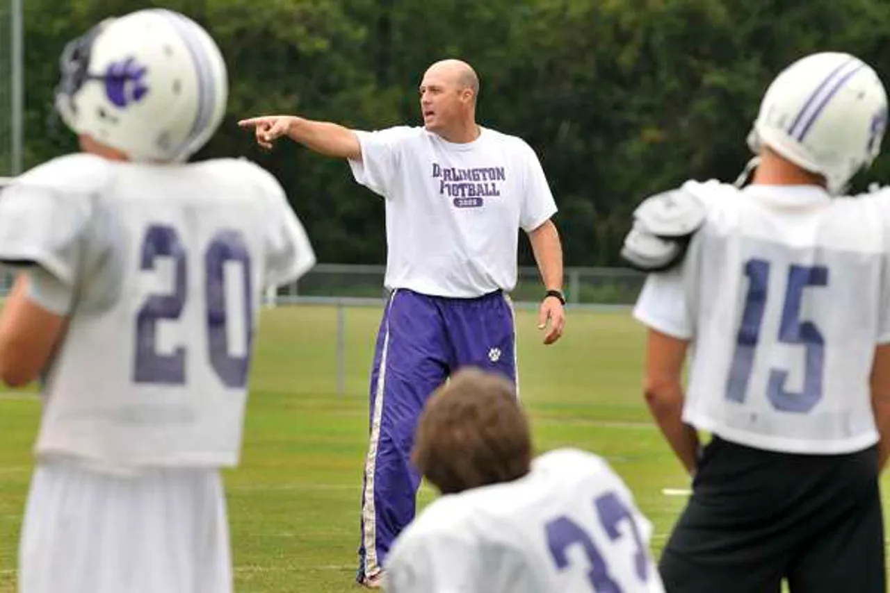 1005_2009_FB_DarPractice2; Darlington head coach Tommy Atha talks to players Monday afternoon during practice. (Photo/Lindy Dugger Cordell) DSC_6074 10-5-09
