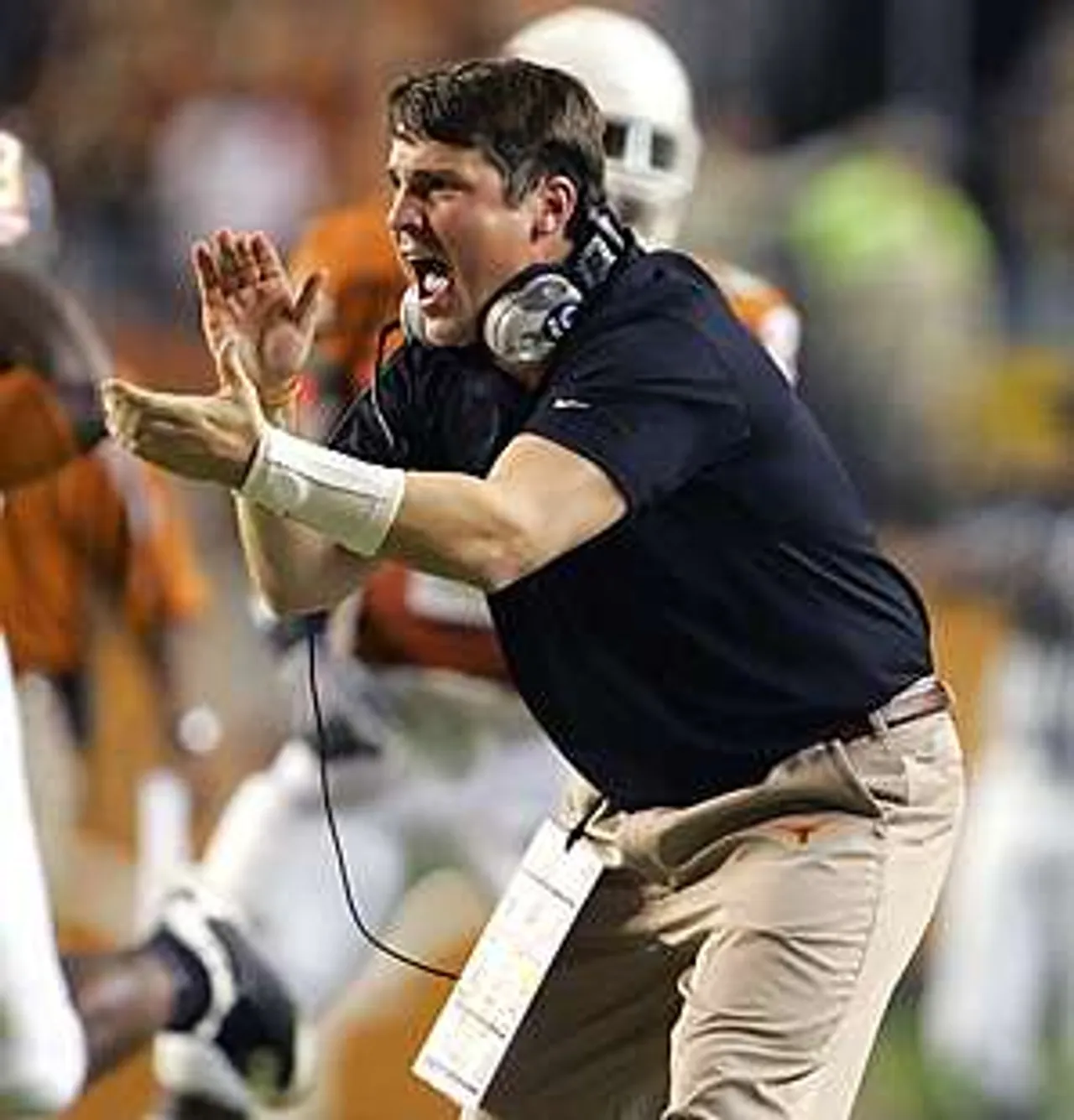 AUSTIN, TX - OCTOBER 18:  Defensive coordinator Will Muschamp of the Texas Longhorns celebrates during the game against the Missouri Tigers on October 18, 2008 at Darrell K Royal-Texas Memorial Stadium in Austin, Texas.  Texas won 56-31.  (Photo by Brian Bahr/Getty Images)