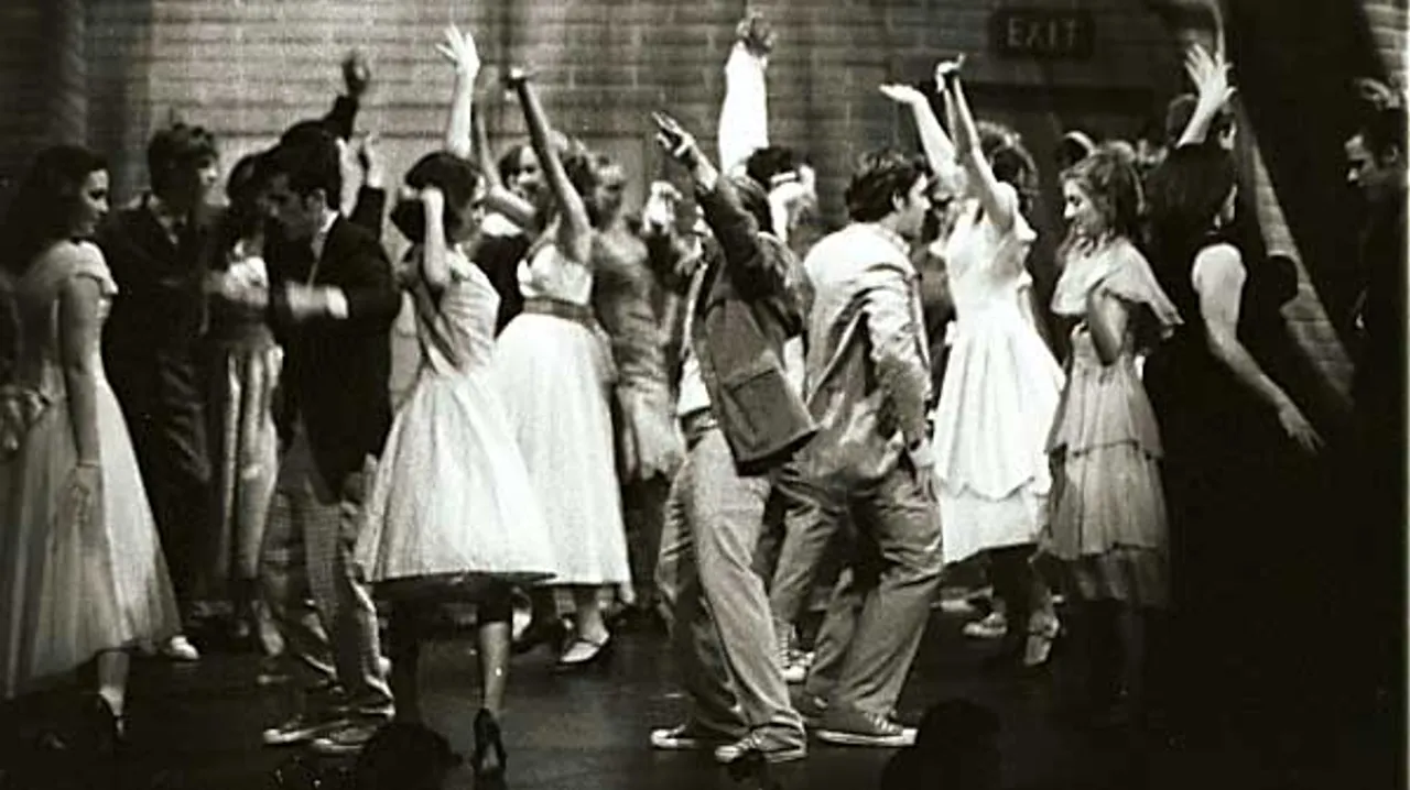 "<I>The Dance at the Gym</I>"