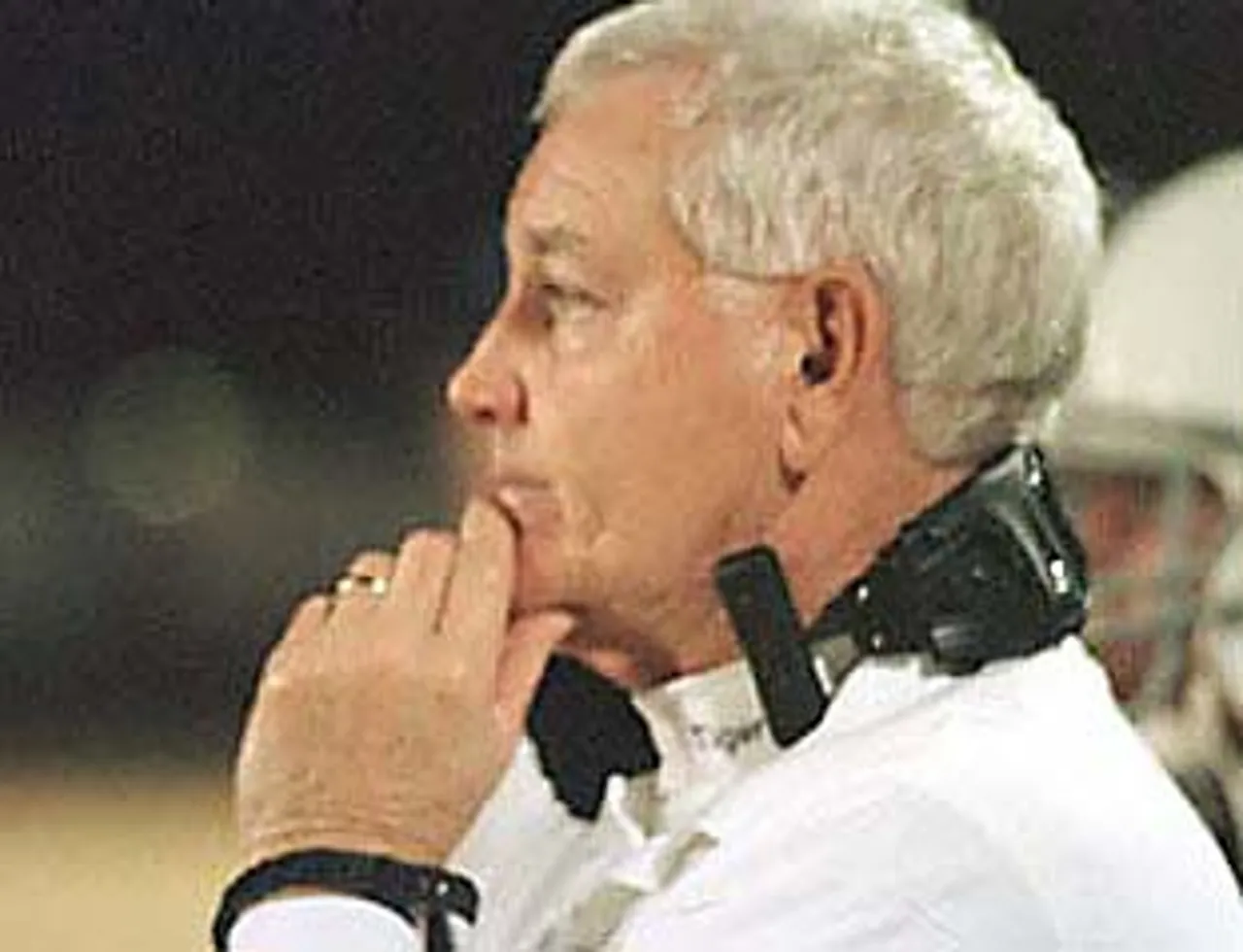 Jerry Sharp pauses to consider a play call.