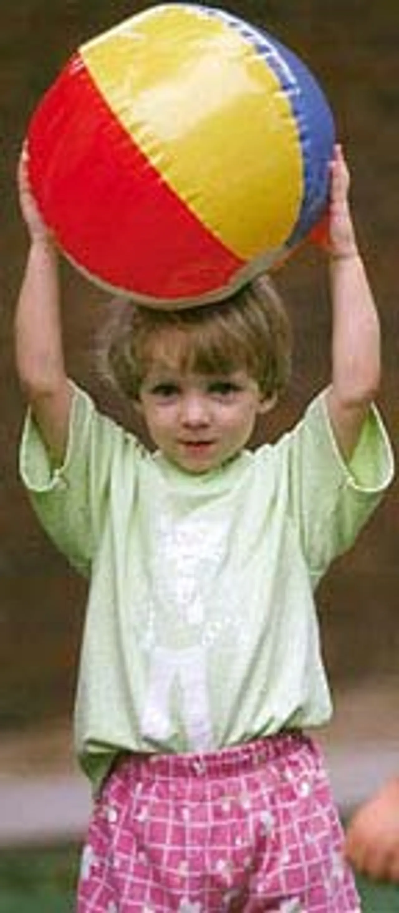 At Camp Delightascope, campers learn body awareness, control, and co-ordination while having fun playing with a giant ball.