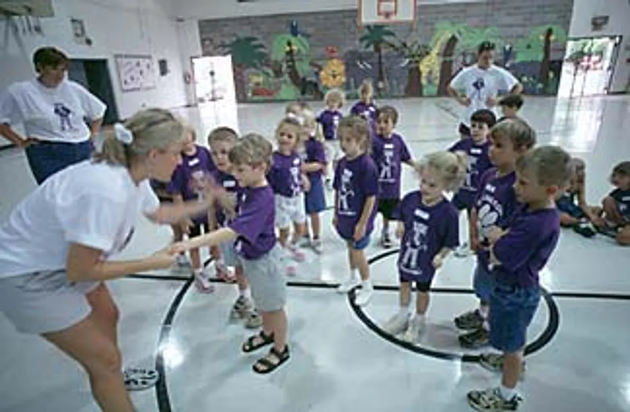 While they explore movements from other countries during international Week, campers listen and learn as counselor Georgia Hall demonstrates a movement. Counselors Shari Cannon and Marinell Saville are waiting to join in the fun.
