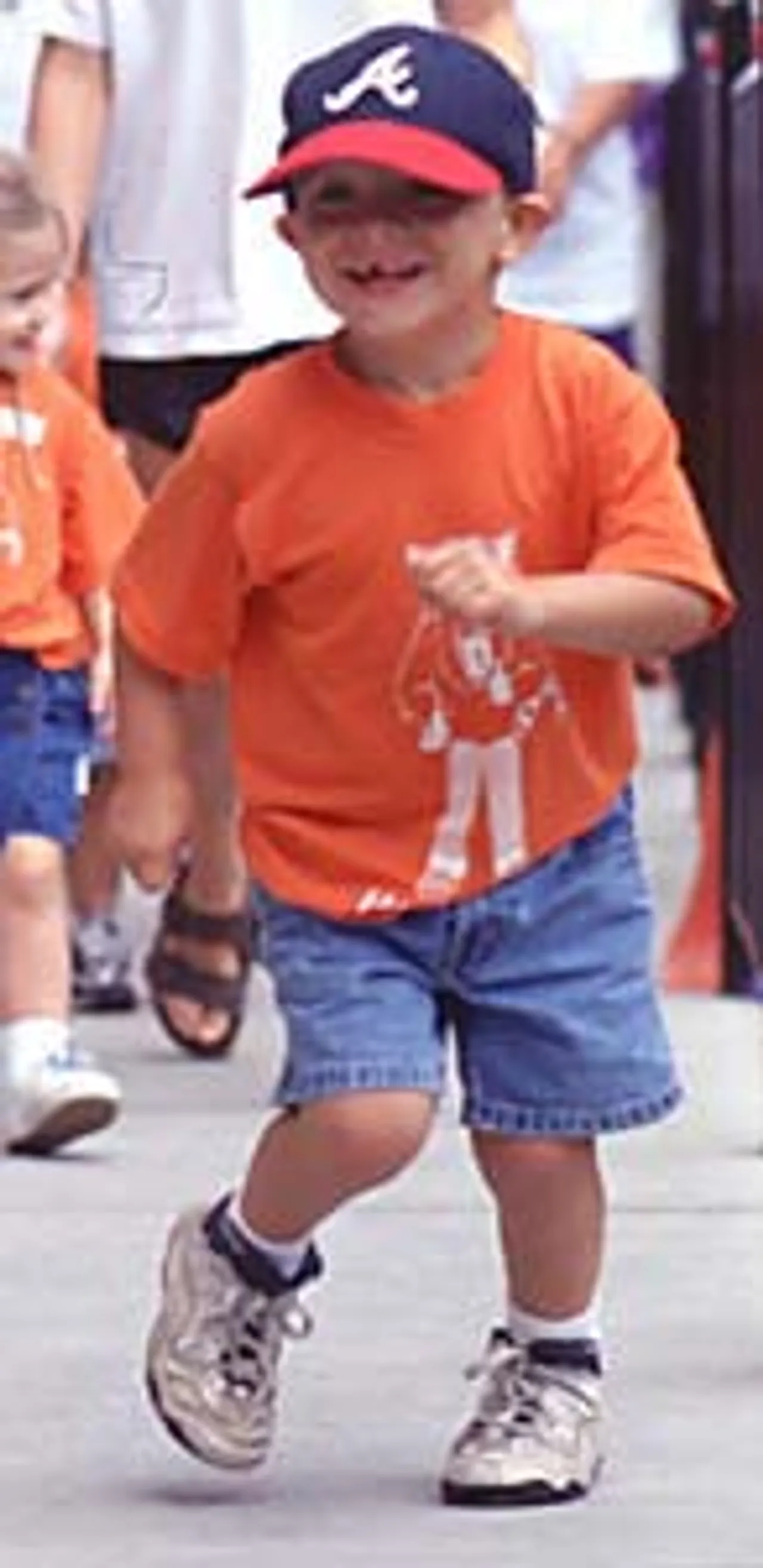 A camper does the “funky chicken” between activities.