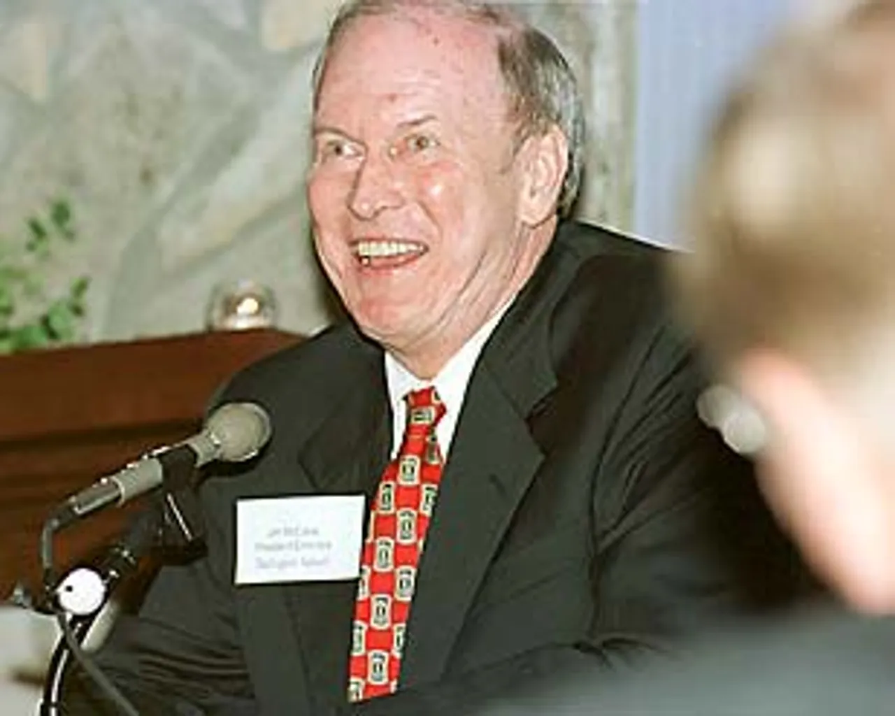 President-Emeritus Jim McCallie describes his nearly 40-year career in education as a prelude to Hicks' address.