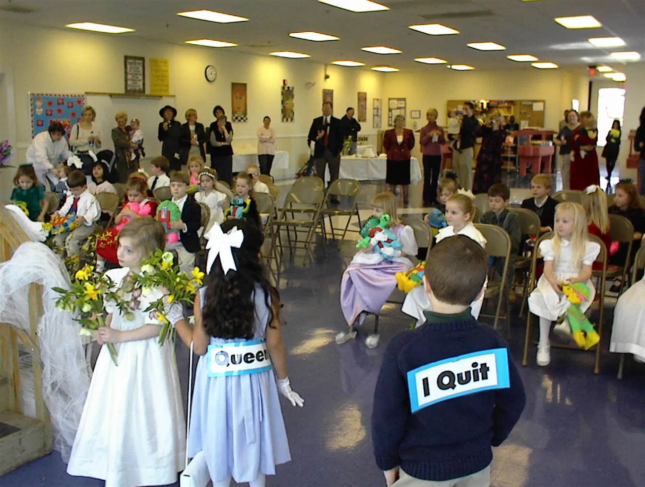 Guests learn that Q and U should be united throughout their lives during a wedding ceremony hosted by pre-kindegarteners at the Lower School.