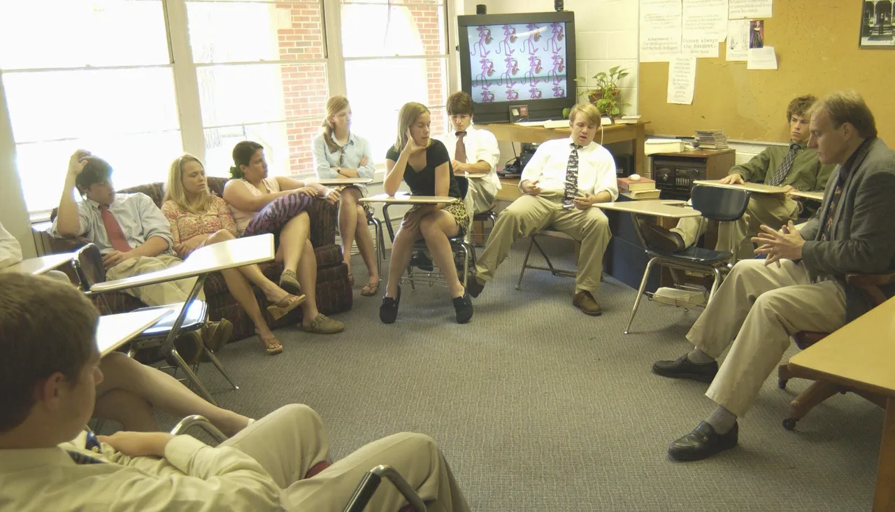 English teacher Skip Saunders discusses the book with his students in a breakout session.