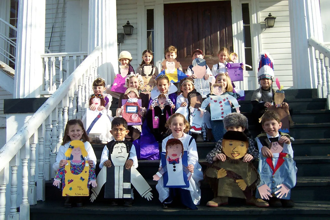 Second grade students dress in their favorite characters from book reports.