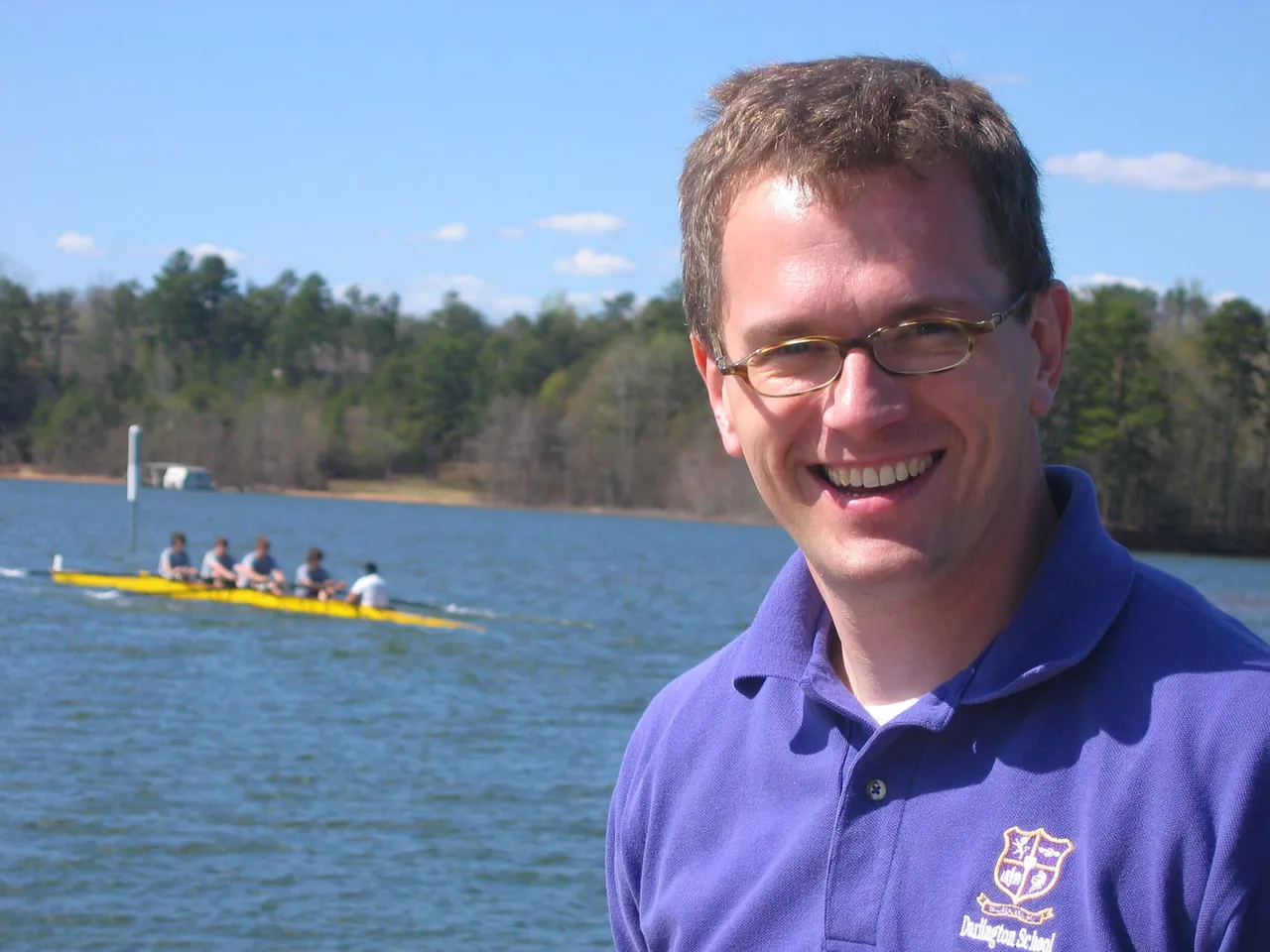 David Corbin, Darlington's crew coach, with the crew on the water behind him at the John Hunter Regatta.