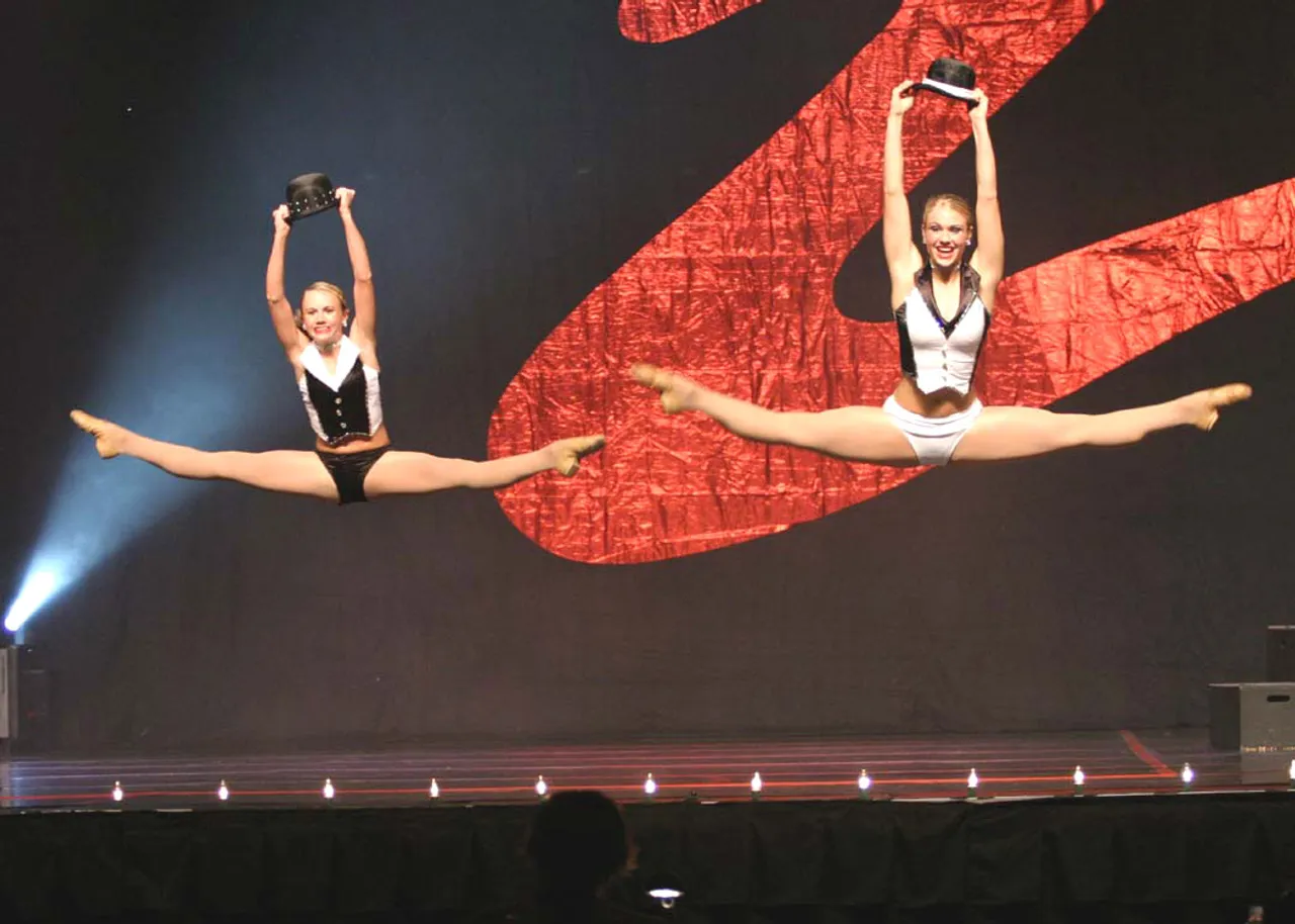 Christie Doss and her sister Mary Frances, a seventh grader at Darlington Middle School, dance in a duet titled "Me and My Shadow." Their performance won first place and high score in all competitions, a first for their studio Centre Stage School of Dance.