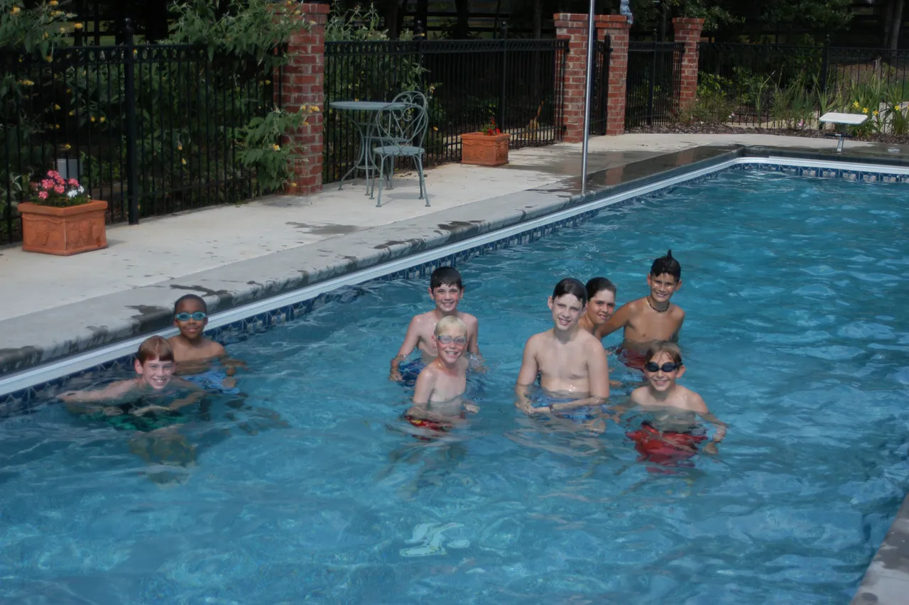 Kristopher Bryant and fellow Darlington classmates swim in his home training pool.