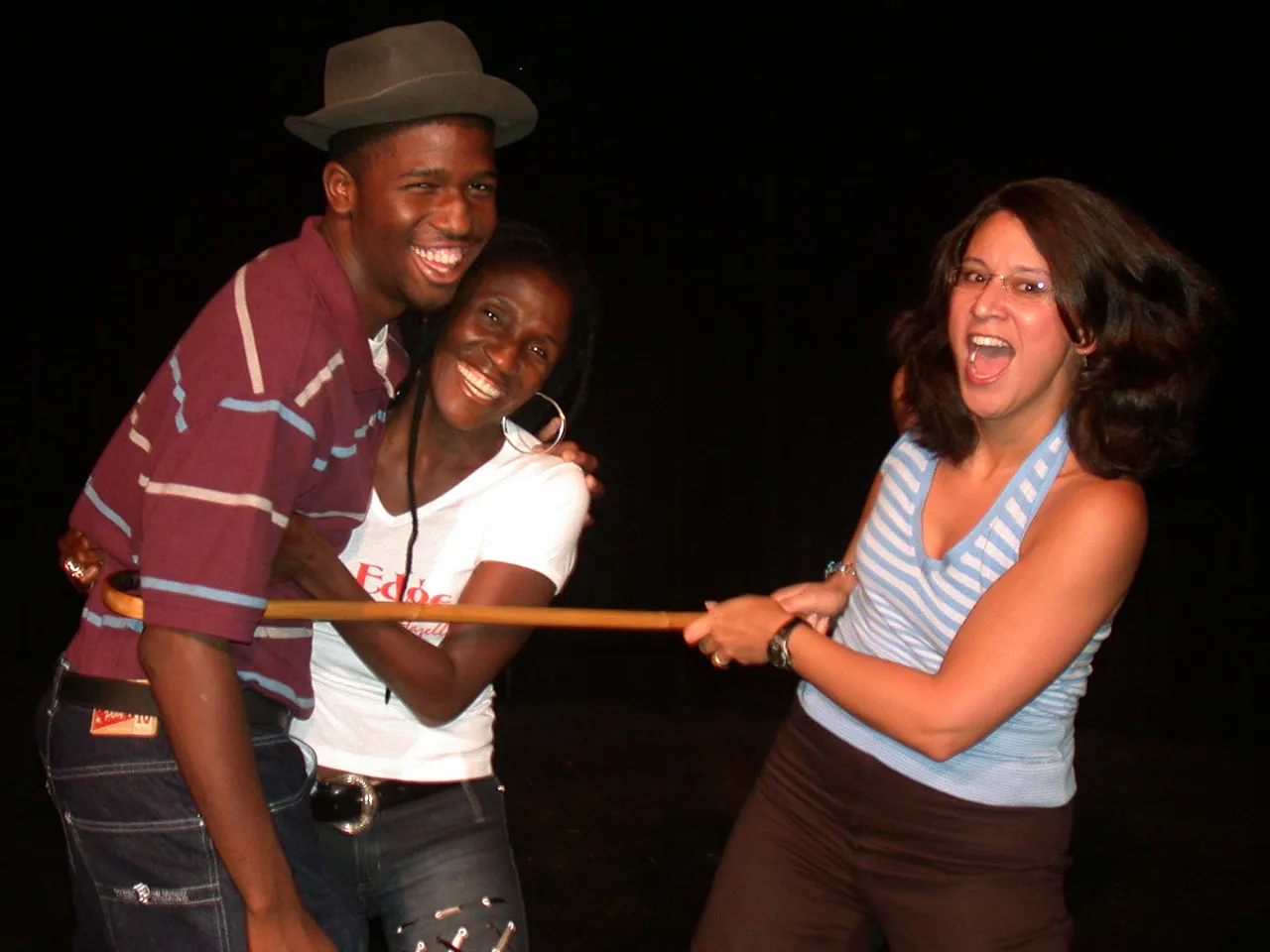 Brandon and Hazelle Goodman with Marisa Ortega, drama and English teacher.