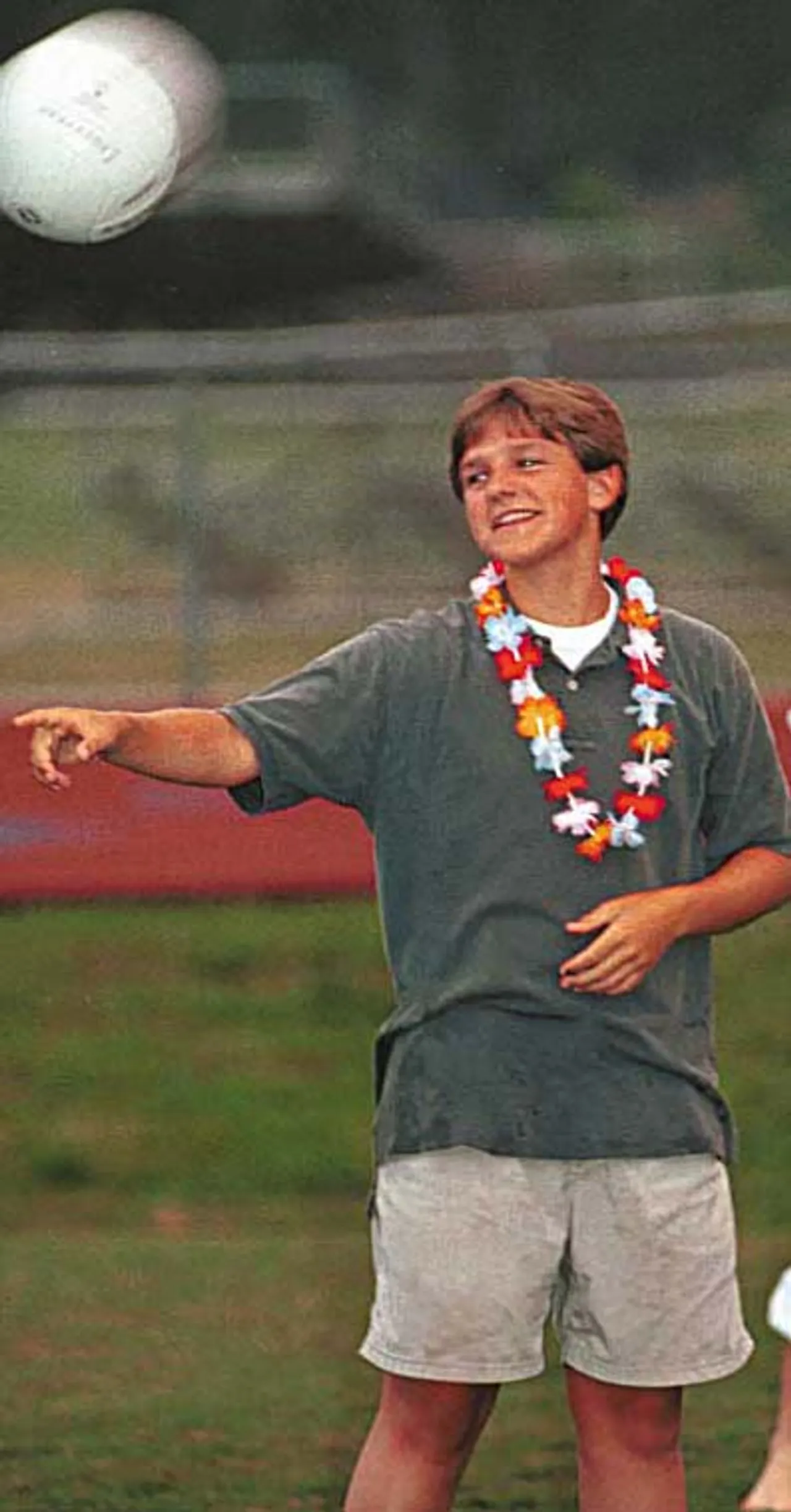 Jeffrey Connelly playfully taunts his volleyball opponents.