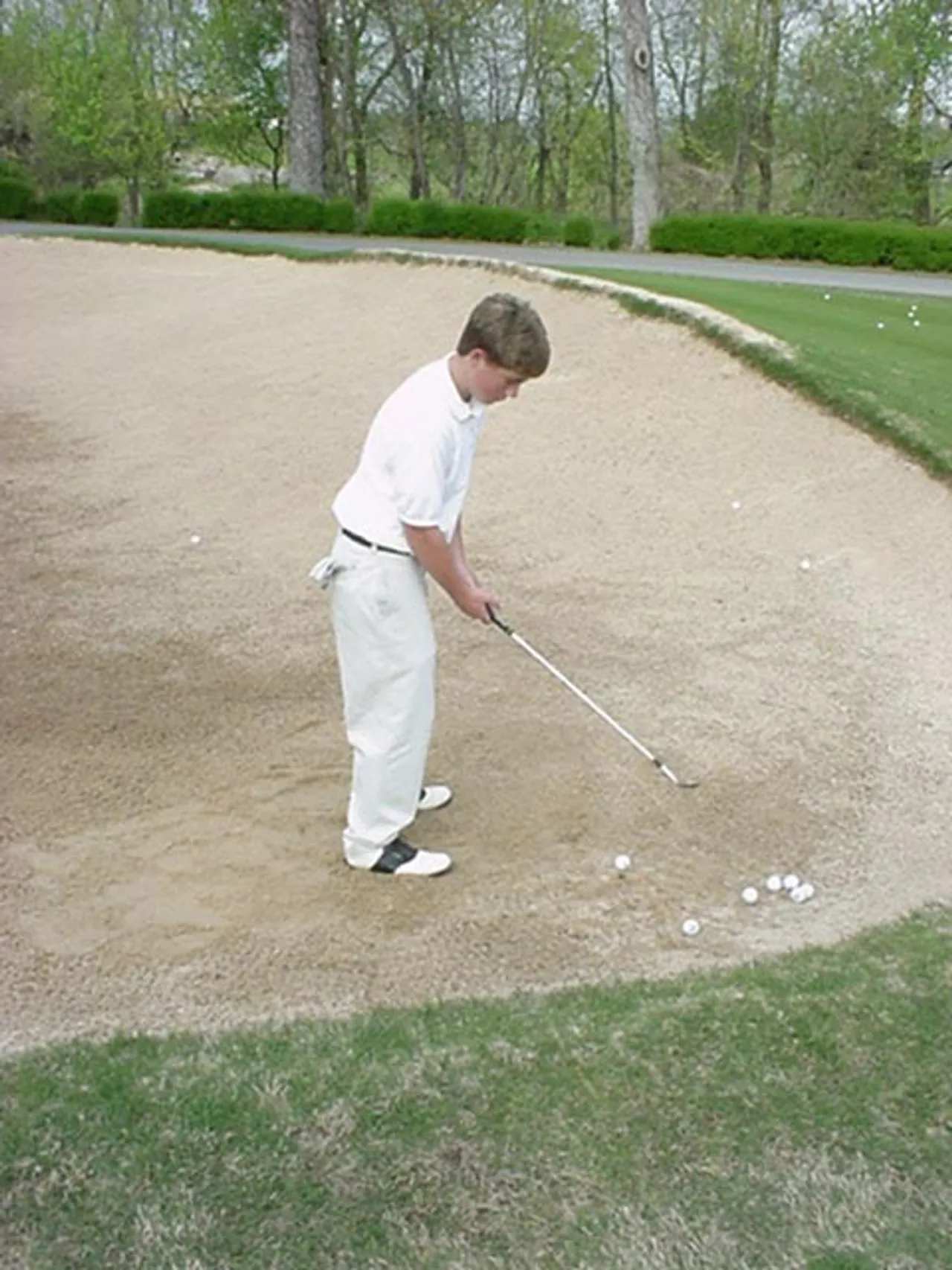 Practicing on his swing, Patrick McShane stays on top of his game. Patrick has been playing golf since he was two.