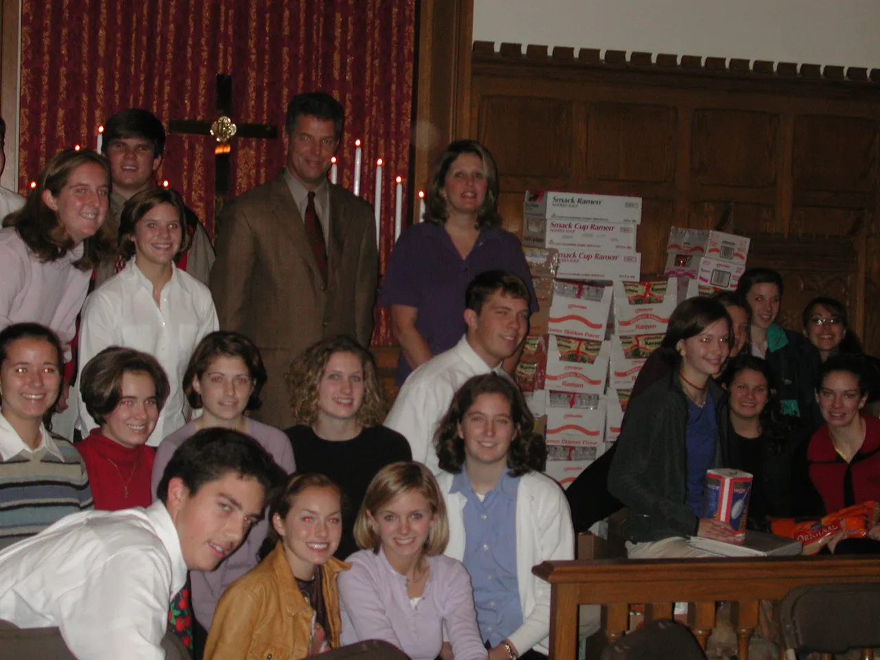 After the annual Thanksgiving service, students who led the food drive to benefit families in the Rome community gathered in the Chapel to celebrate its success.