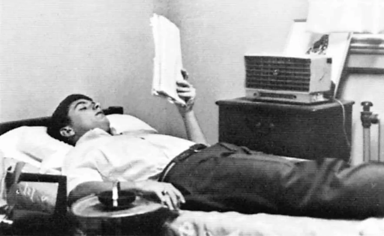 1967 Jabberwokk photo of Butch Huffman relaxing in his dorm room.