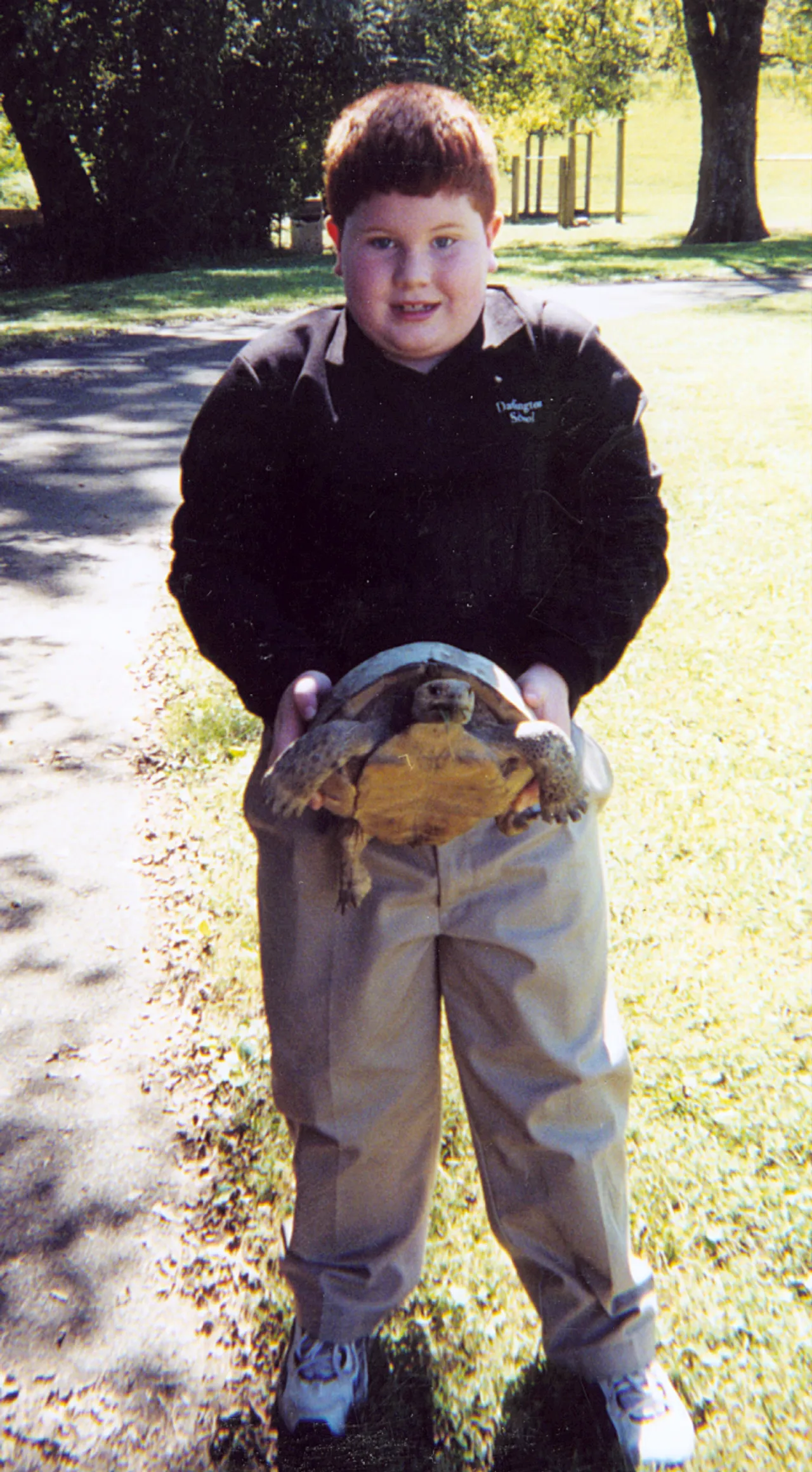 Matt Goldin holds Bondo, the tortoise.