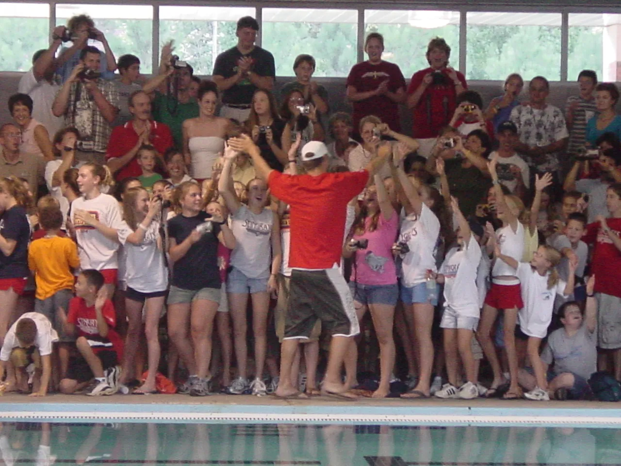 Michael Phelps and clinic participants.