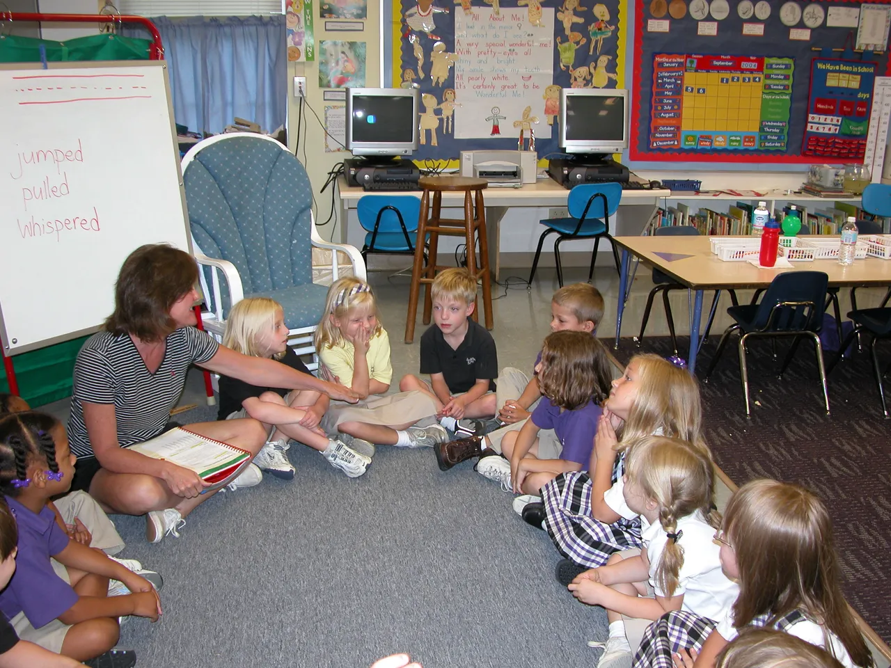 Kindergarten teacher Alyce Watson has students enthusiastically involved in a rhyming activity.