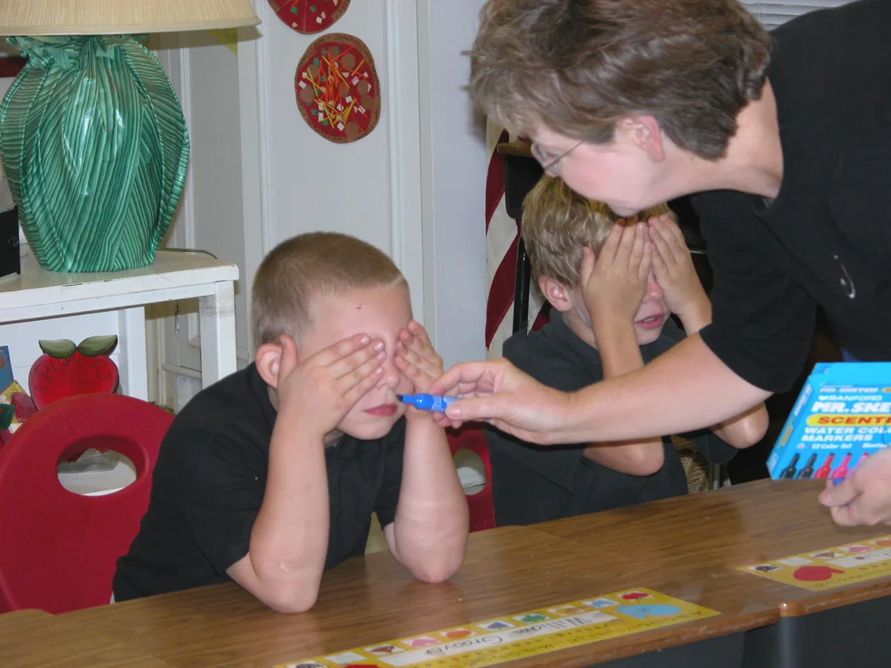 Pre-first teacher Janice Cox does a special "sensing" brain activity with William Groover and the rest of her class.