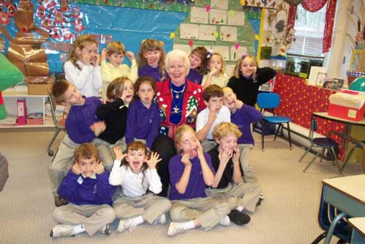 Retired Lower School teacher Barbara Cordle visits the first grade in 2001 to tell stories and introduce her imaginary pet flea, Elmer. Cordle and Elmer captivated young audiences for 24 years at the Lower School and continue to intrigue children during their occasional visits.