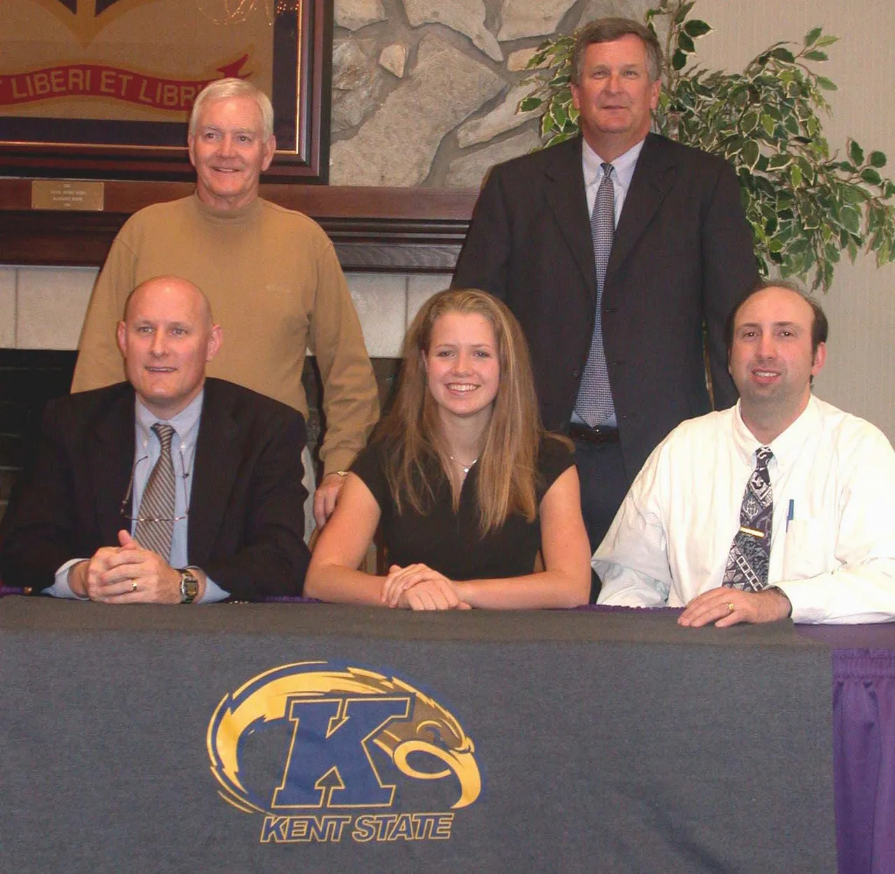(Front) Rome parent Dale Smith, Varsity Volleyball Head Coach Jim Linos, (back) Athletic Director Jerry Sharp, and Headmaster David Rhodes pose with Anja Knabe-Paulsen after she signs to play volleyball for Kent State.