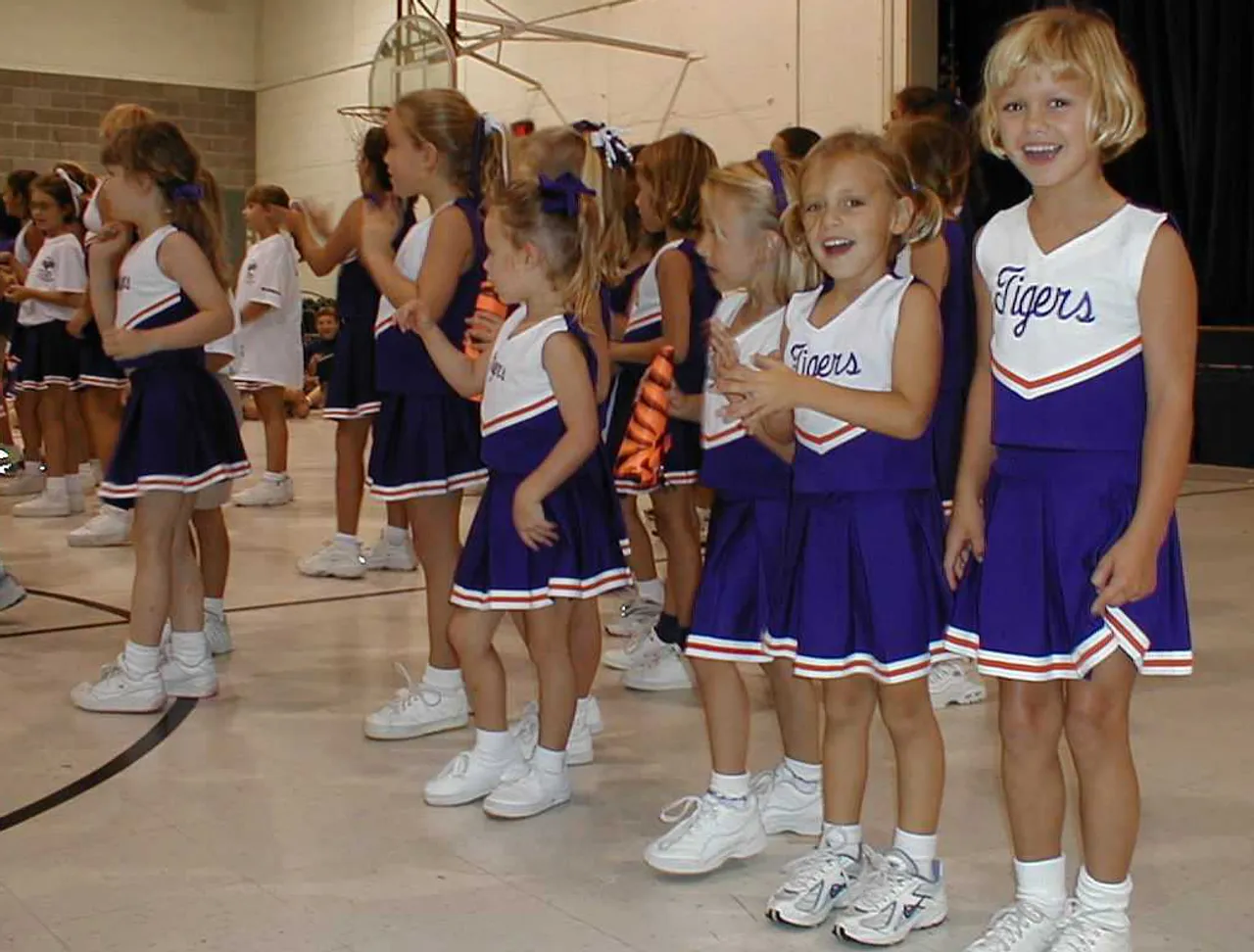 Lower School cheerleaders continue to show their spirit during a pep ralley in the Lower School gym, Friday, Sept. 7.