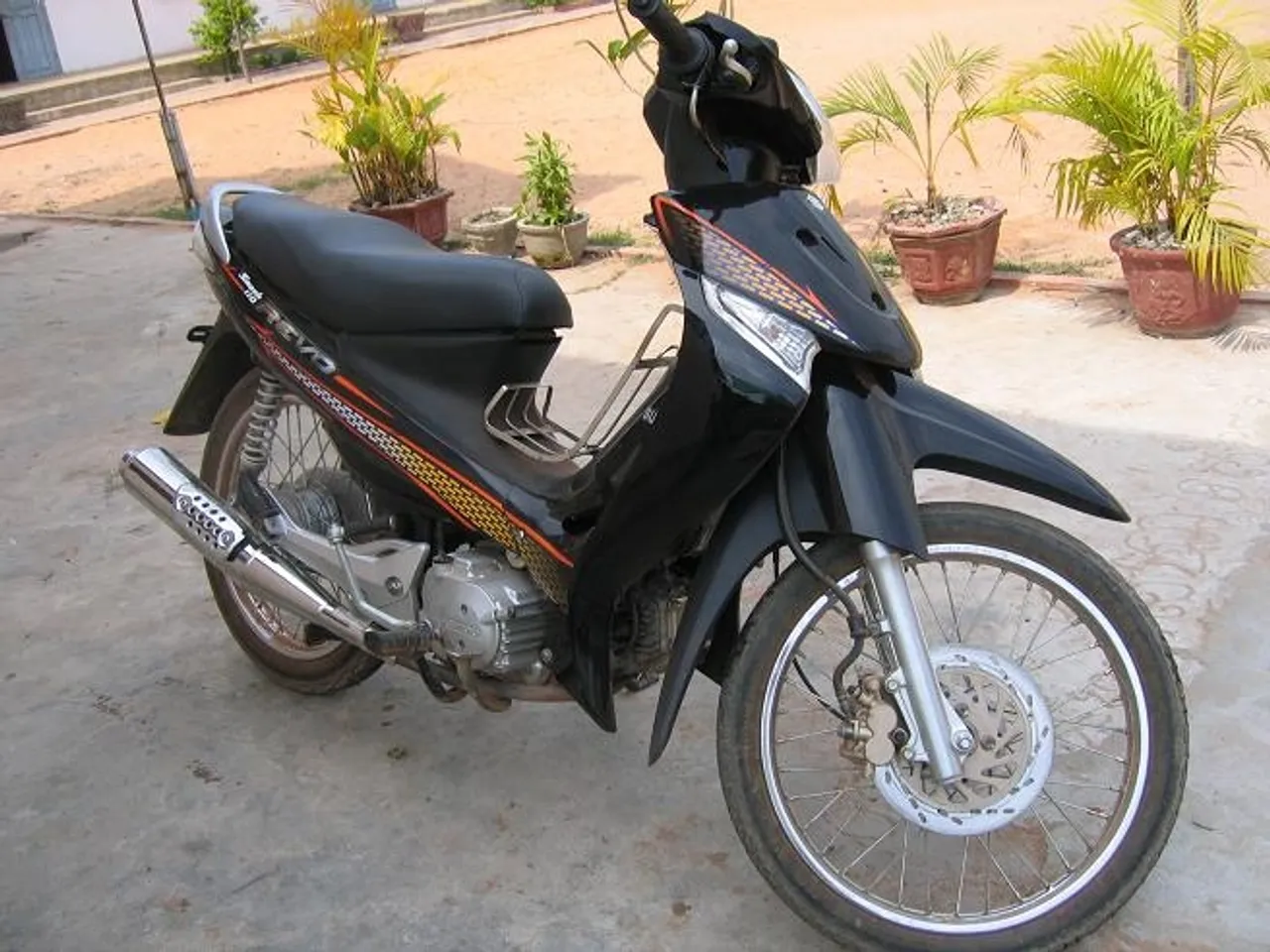 Thanks to funds raised by Mitchell Maddox's advisee group, Savong School was able to purchase a motorbike to transport teachers to and from school.