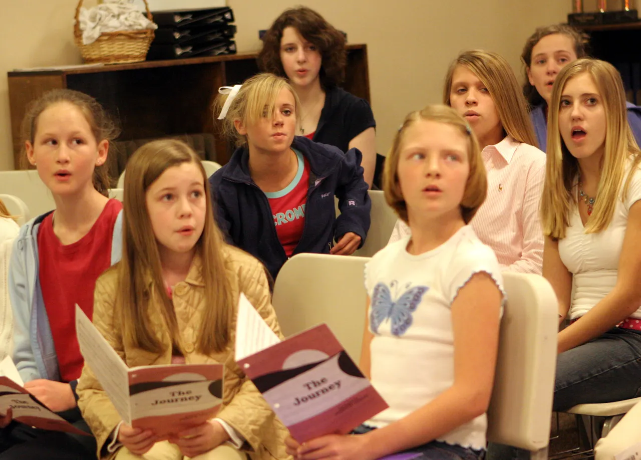 The Middle School Chorus rehearses for the All-Star Music Festival.