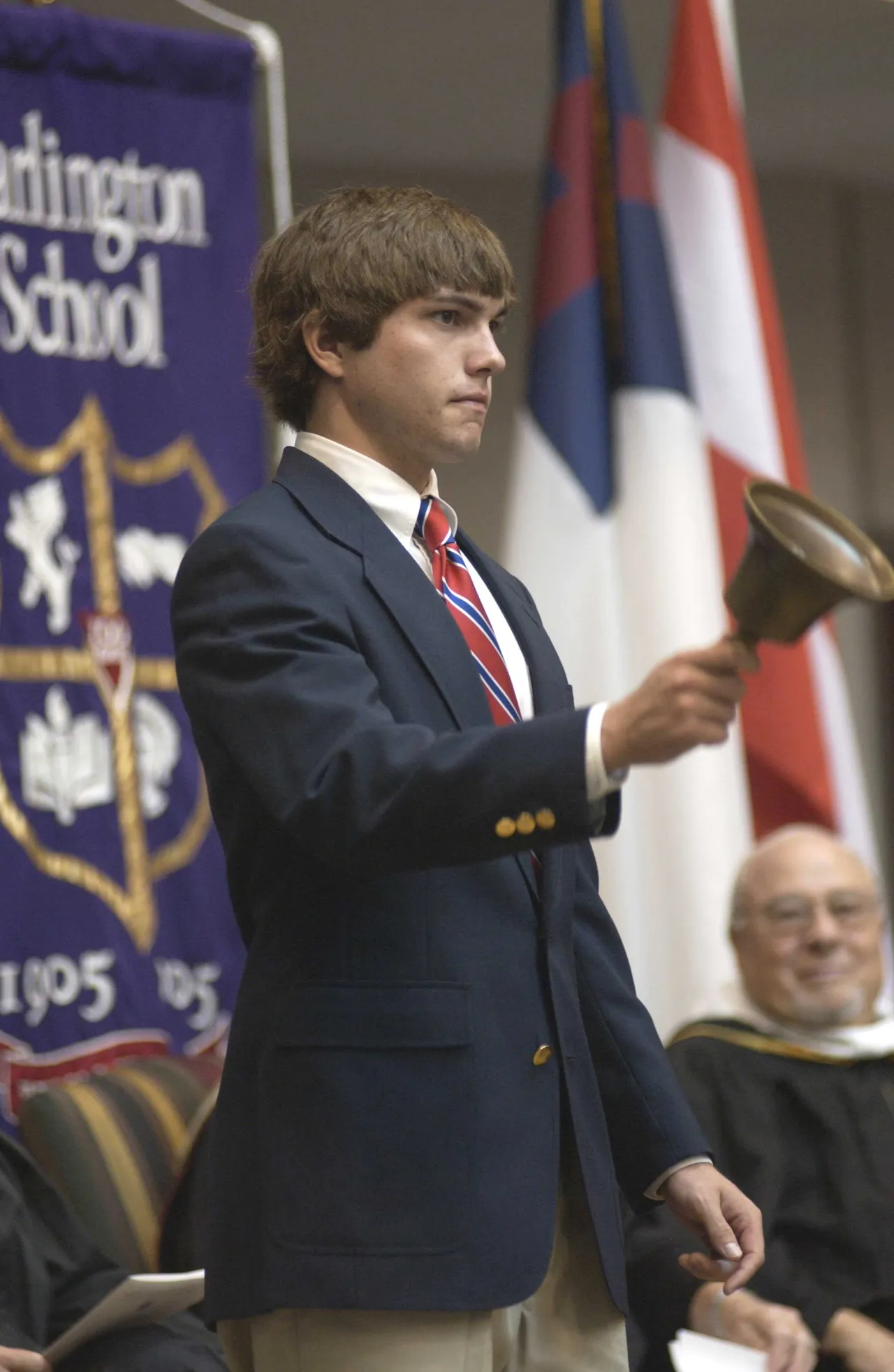 Senior Class President Peter Whatley rings in the new school year