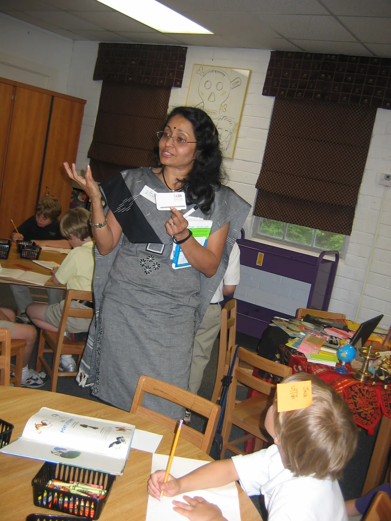 Dhir visits with first-graders.