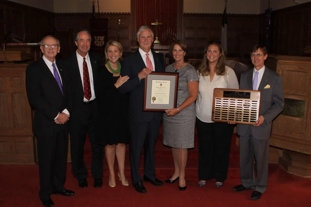 Distinguished Alumnus Gordon Smith ('71) pictured with his wife, Jane; two daughters; and Board Chairman Frank Stegall ('62), Headmaster Tom Whitworth and Chief Advancement Officer Joe Montgomery.