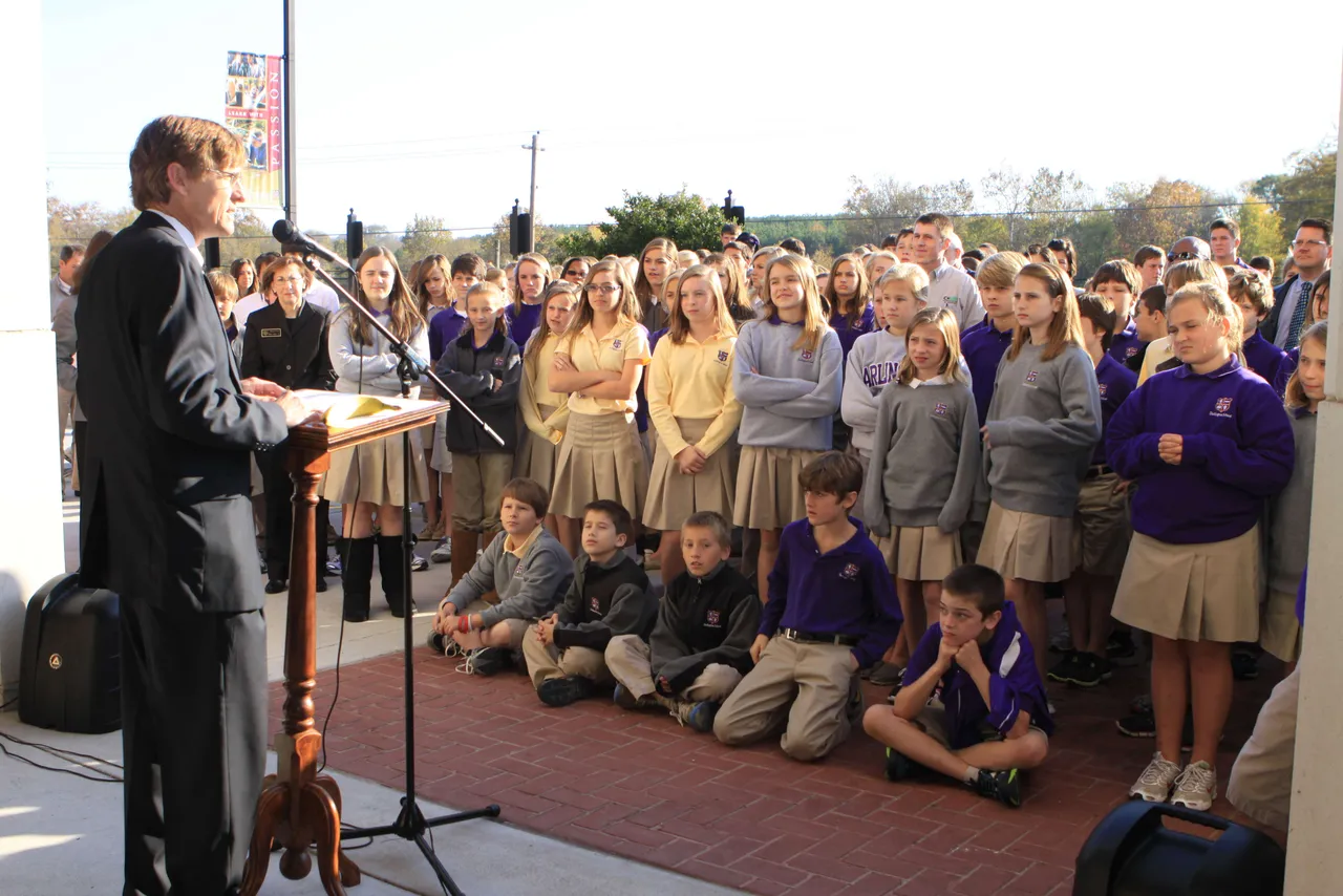 Joe Montgomery welcomes students, faculty and special guests.
