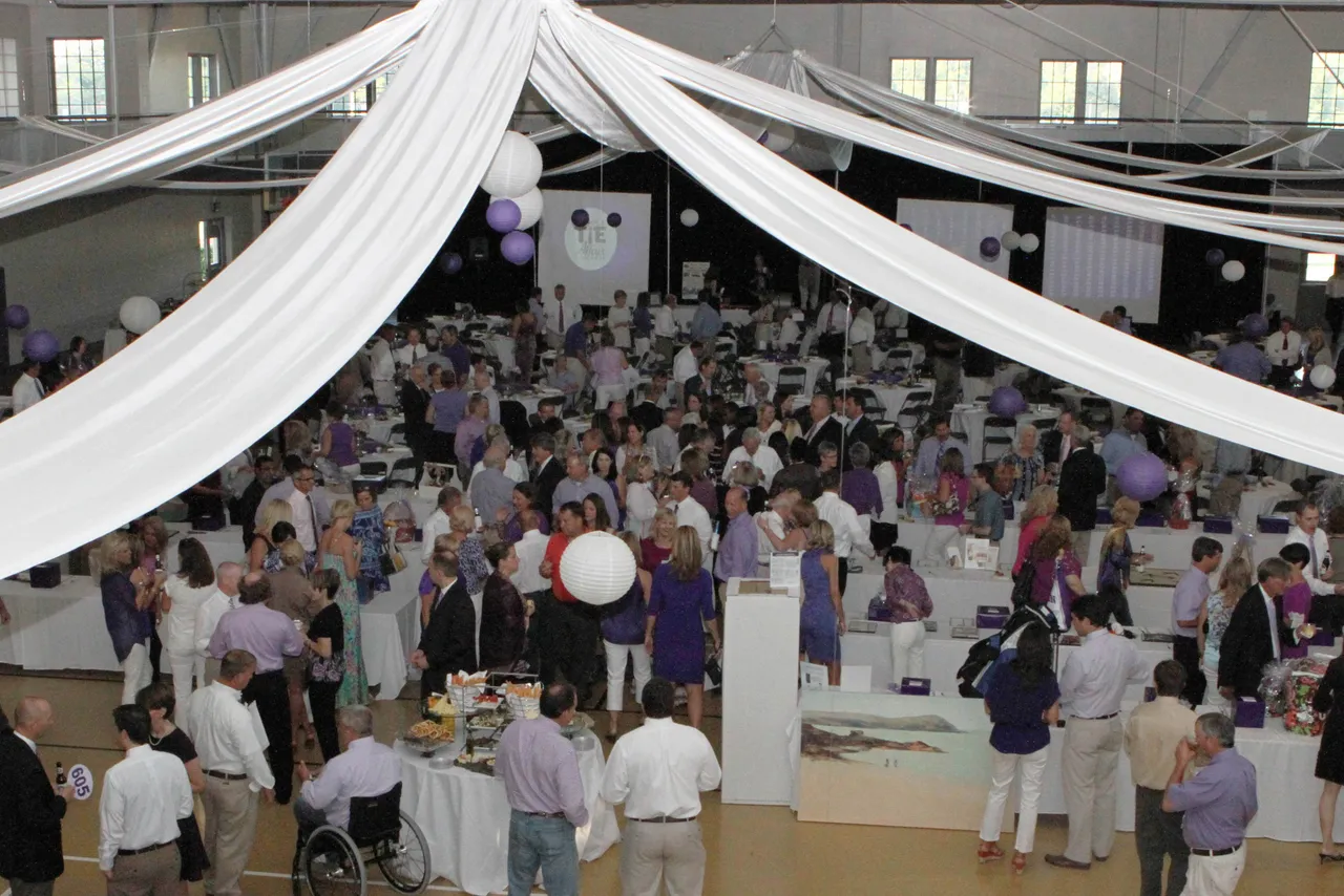Patrons in purple fill the Johnson Field House at last year's Purple Tie Affair.