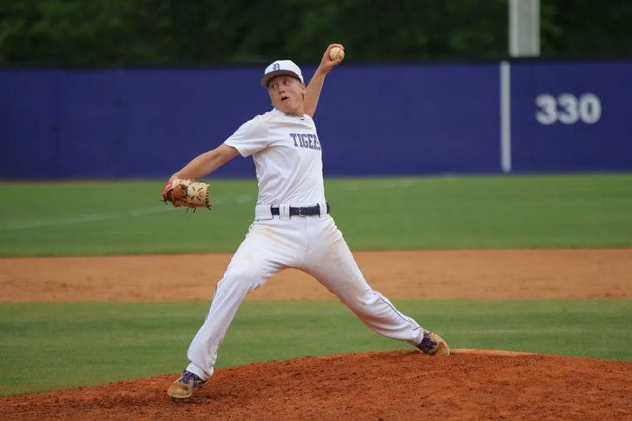 Junior Jay Shadday delivers a pitch during the Tigers’ 5-0 win over GAC in Game 1. (Photo credit: Tyler Greenawalt / Rome News-Tribune)