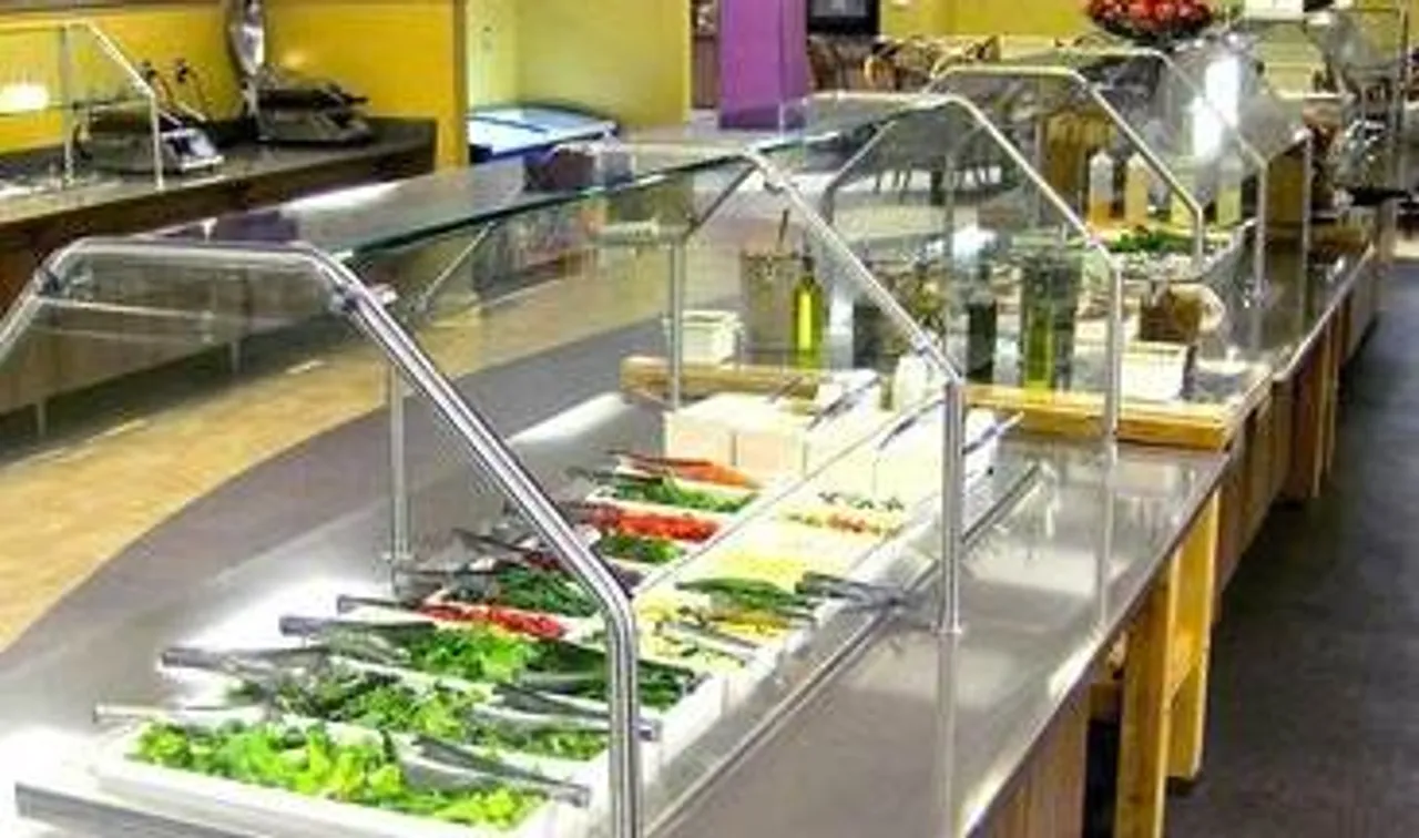 The salad bar at the Upper School's Dodd Dining Room features several different selections of greens and a variety of fresh toppings.