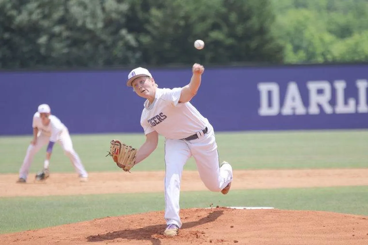 Junior Jay Shadday delivers a pitch during the Tigers’ 5-2 win over Rabun County in Game 1. (Photo credit: Tyler Greenawalt / Rome News-Tribune)