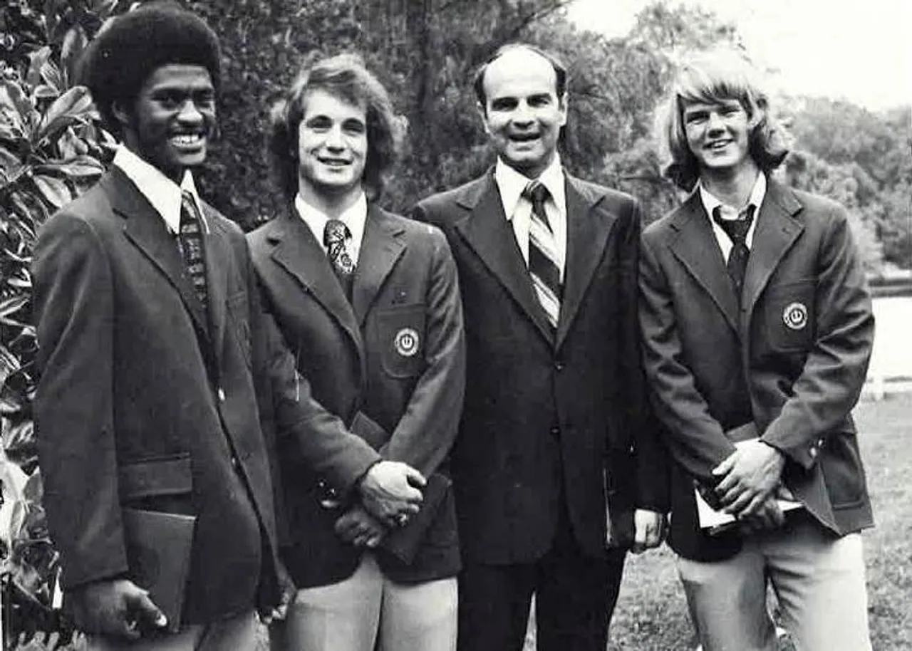 Elson Floyd ('74), Thom Young ('74) and Doug Hendrickson ('74) pictured with then-President Gordon Bondurant at their Commencement.