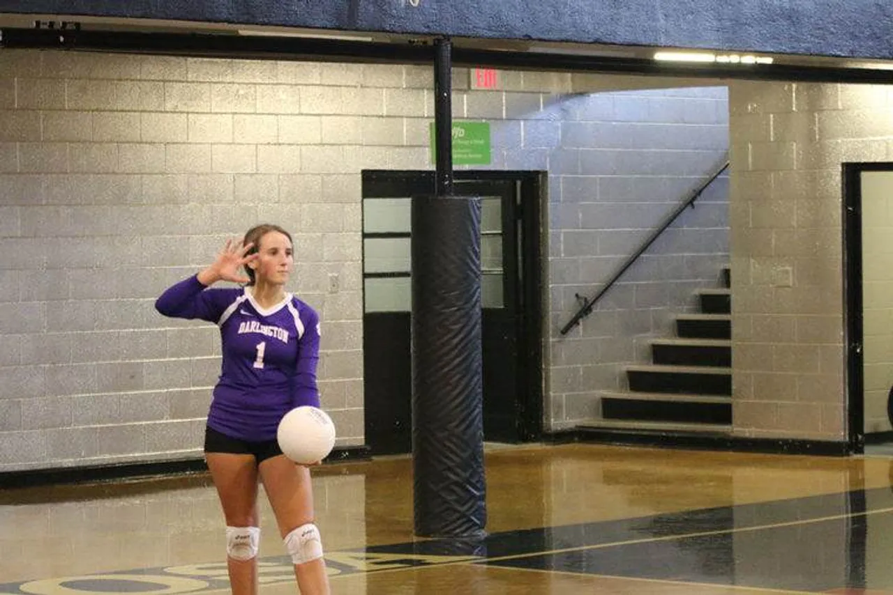 Sophomore Callie Maffett prepares to serve during the team's 25-15, 25-15 victory against Temple on Sept. 29, 2015. (Photo credit: Tommy Romanach/RN-T.com)